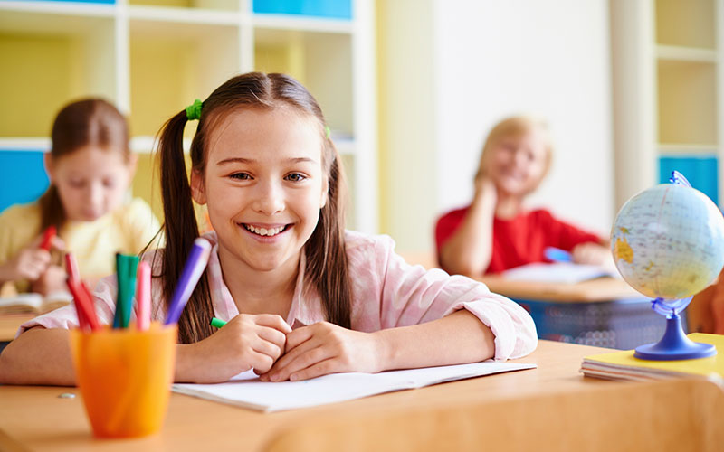 girl-with-big-smile-classroom